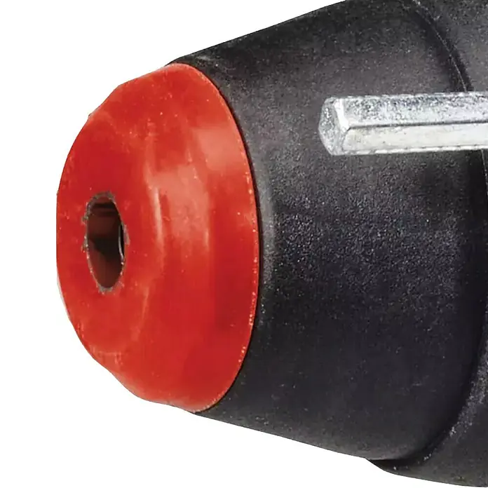 Einhell Martillo combinado TE-RH 32-1600 4F - 1.600 W, 4,5 J, Alojamiento SDS-Plus - Primer plano de una pistola de pegamento caliente con una boquilla roja y una llave Allen para el ajuste. Ideal para manualidades y reparaciones.