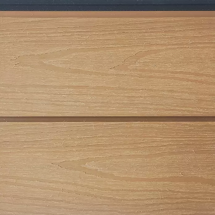 Dioco Revestimiento decorativo texturado - L x An x Es: 2.200 x 148 x 21 mm, Marrón - Superficie de madera clara con veta y un borde oscuro en la parte superior.