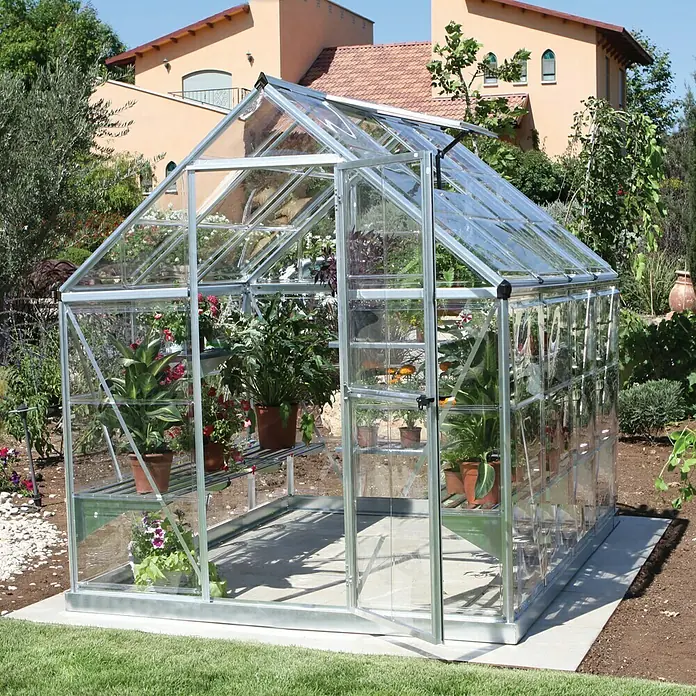 Palram – Canopia Invernadero Harmony - Medidas ext. (An x Pr): 185 x 247 cm, Plateado, Área: 4,6 m² - Invernadero con paredes transparentes y entrada abierta, lleno de plantas en estantes, proporciona un espacio ideal para los jardineros.