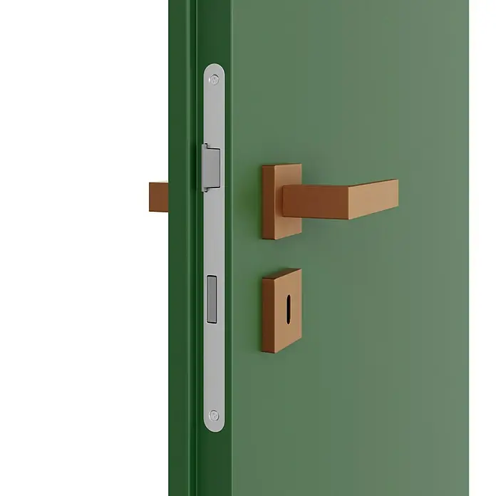 Diamond Doors Creative Zimmertürgarnitur Savannah - Stärke Tür: 40 mm - 45 mm, Kupfer, Buntbart - Detailaufnahme einer grünen Tür mit modernem Türgriff und Schloss. Elegantes Design für ein sicheres Zuhause.