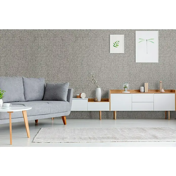 Bariperfil Panel acústico decorativo Acoustic Wall - 260 x 60 x 0,65 cm, Gris - Esta imagen muestra un sofá gris, una mesa de centro y un aparador blanco con una tapa de madera en un salón moderno.