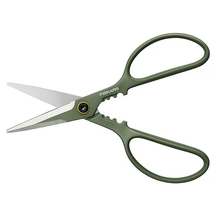 Fiskars Schere - Elegante, freistehende Werkzeughalterung zur praktischen Aufbewahrung, Material Klinge: Stahl, Präzisionsgeschliffen - Eine Nahaufnahme einer grünen Fiskars-Schere mit scharfen, silbernen Klingen, ideal zum Schneiden von Papier, Stoff und anderen Materialien.