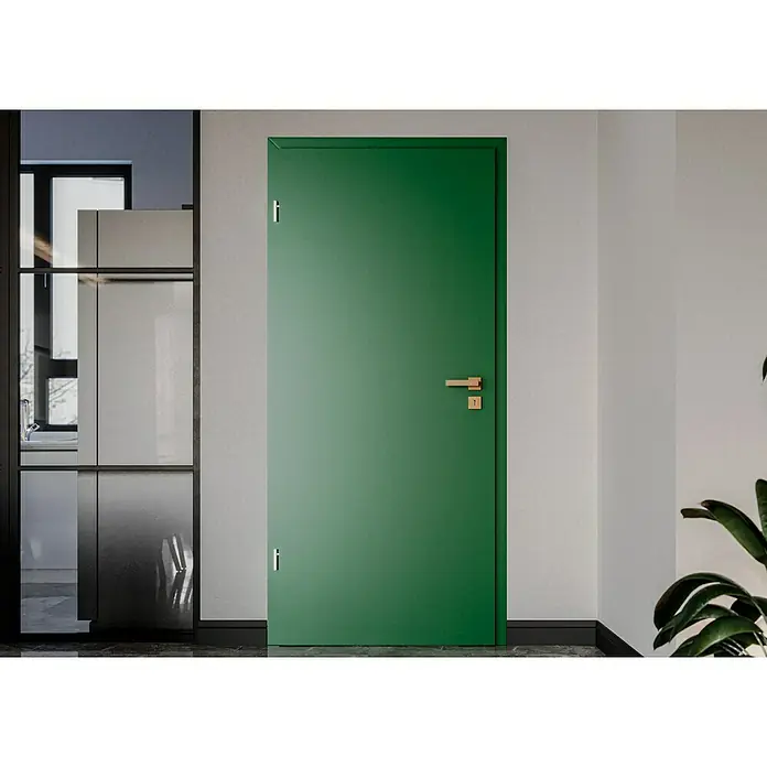GetaDoor Getalit Türzarge FM8237 - 860 x 1.985 mm, Wandstärke: 205 mm, DIN Anschlag: Links, Edeltanne - Nahaufnahme einer modernen, glatten, grünen Innentür mit Griff und Schloss in einem eleganten Haus, die zeitgenössisches Design verkörpert.