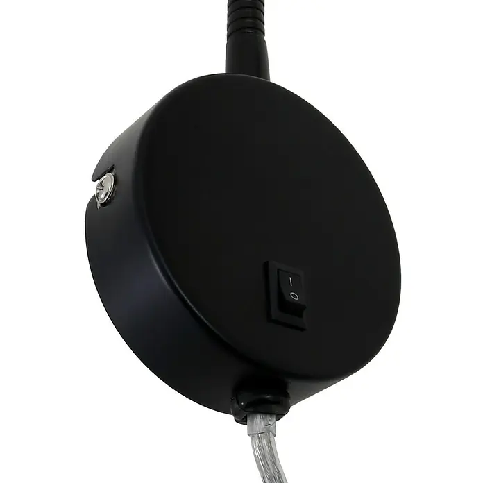Briloner Foco de pared LED Comfort Light - Negro, 4 W - Primer plano de una lámpara de lectura negra con interruptor, que muestra un diseño moderno y funcionalidad.