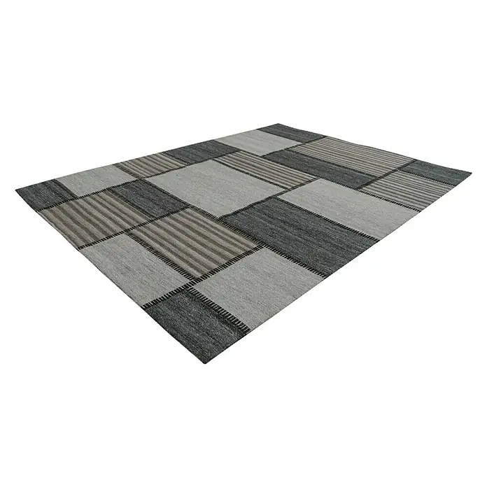 Kayoom Flachgewebeteppich Phönix - Grau/Braun, 230 x 160 cm, 75 % Wolle, 20 % Baumwolle, 5 % Polyester - Dieser Teppich hat ein Patchwork-Design mit verschiedenen Grautönen und Texturen, ideal für ein modernes Zuhause.