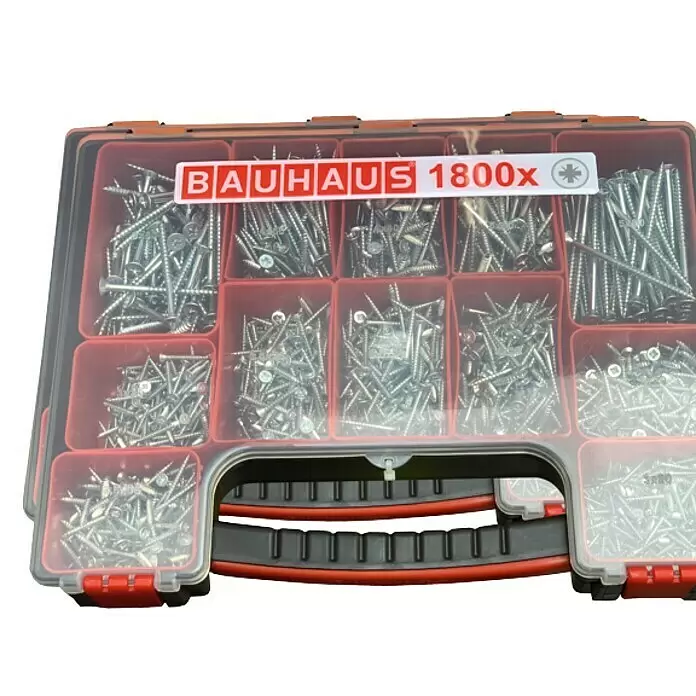 BAUHAUS Surtido de tornillos multiuso - Ranura en forma de cruz Pozidriv, 1.800 pzs. - Caja organizadora transparente con varios tornillos plateados. Con etiqueta 'BAUHAUS 1800x' e icono de accionamiento en estrella.