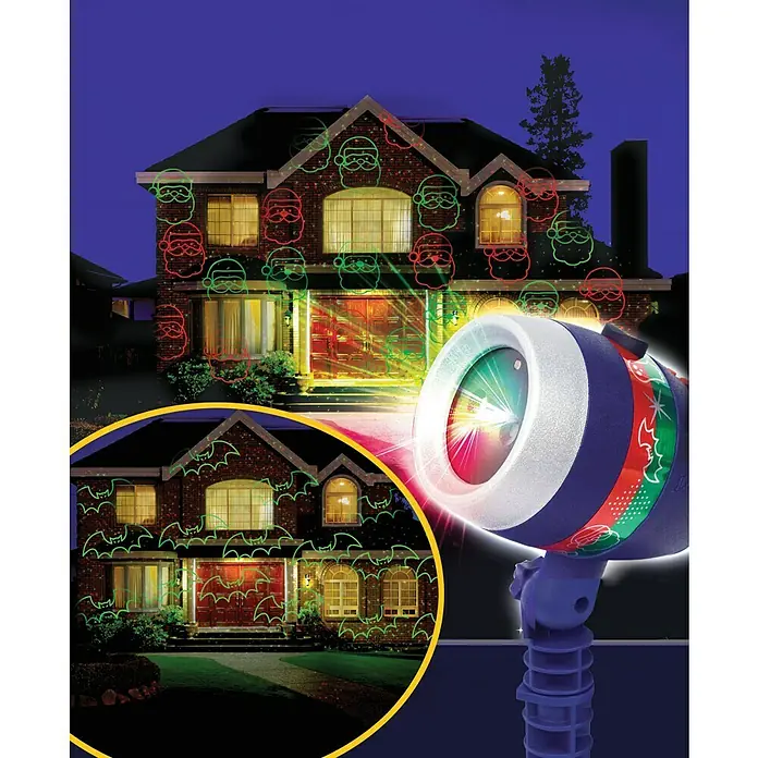 Proyector LED Star Shower - L x An x Al: 13,5 x 10 x 25 cm - Imagen de una fachada de casa iluminada con un proyector láser con motivos de Papá Noel o murciélagos.