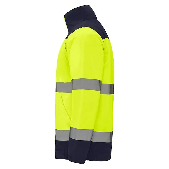Chaqueta de alta visibilidad Epsylon - M, Amarillo flúor/Azul - Vista lateral de una chaqueta de seguridad amarilla de alta visibilidad con rayas reflectantes y cuello y dobladillo azul marino.