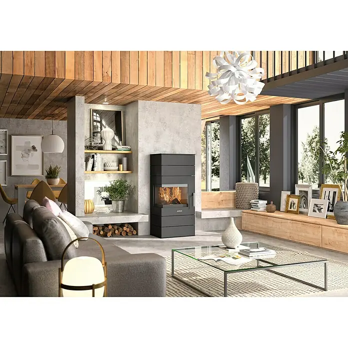 Justus Wärmespeicherblock E-Block - L x B x H: 45,5 x 62 x 17 cm - Ein elegantes Wohnzimmer mit einem modernen, grauen Kaminofen als zentralem Blickfang, der Wärme und Stil in den Raum bringt.