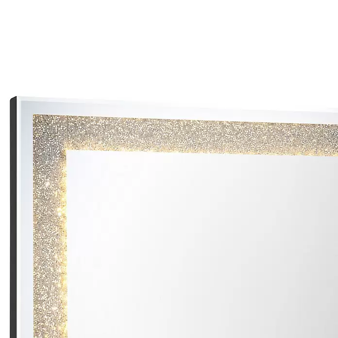 LED-Lichtspiegel Glimmer - 50 x 70 cm, Rechteckig - Spiegelecke mit glitzerndem, champagnerfarbenem Rahmen und Details aus zerstoßenen Kristallen.