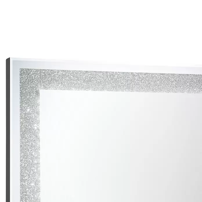 LED-Lichtspiegel Glimmer - 50 x 70 cm, Rechteckig - Spiegel-Ecke mit funkelndem silbernem Rahmen im zerbrochenen Diamant-Effekt.