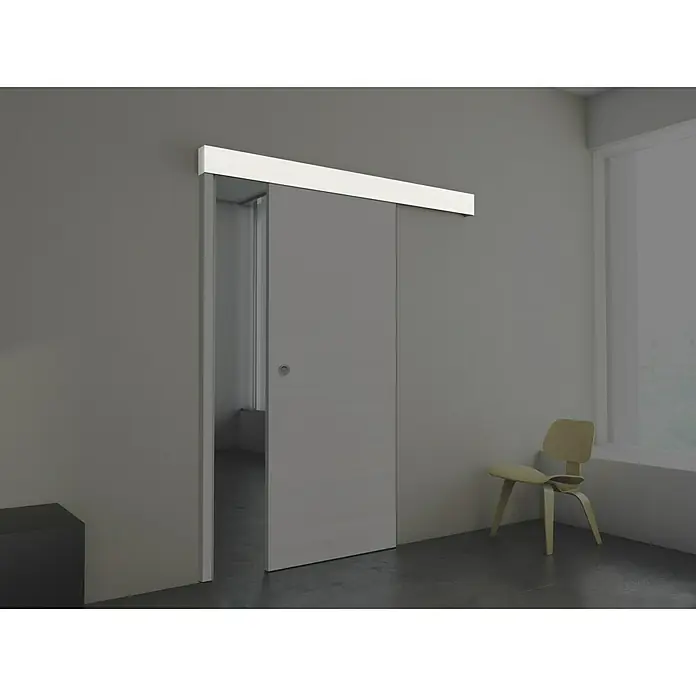Solid Elements Embellecedor exterior Fresno Eslovenia - 2.000 x 100 mm, Blanco - Puerta corredera en una habitación minimalista con un marco claro. El diseño limpio se integra perfectamente en un entorno moderno.
