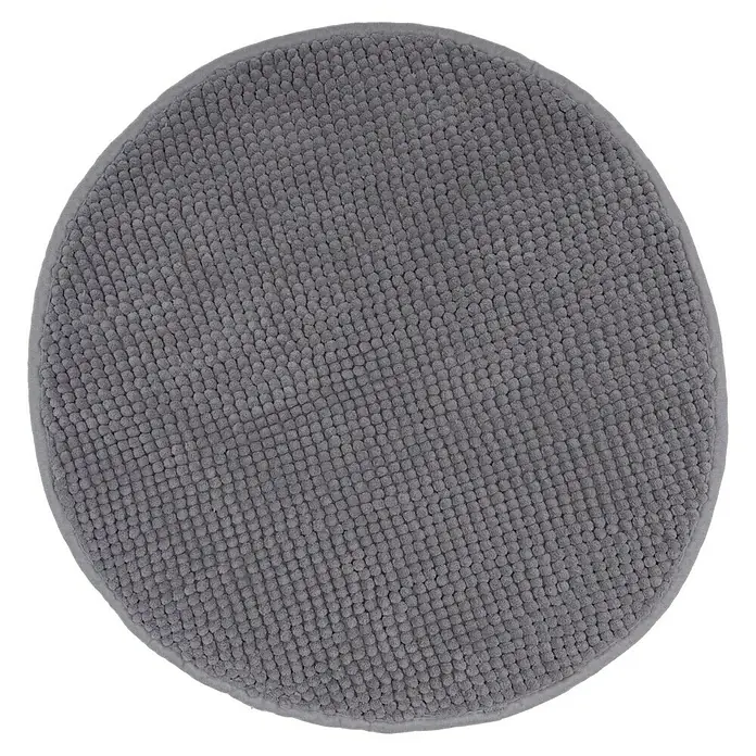 Camargue Badteppich Zottelino - 55 x 55 cm, Grau, 100% Polyester - Nahaufnahme einer runden, grauen Badematte mit Noppenstruktur auf schwarzem Hintergrund. Ein gemütliches Accessoire für jedes Badezimmer.