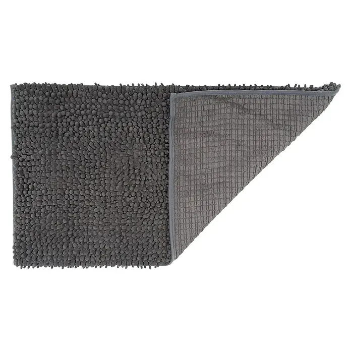 Camargue Badteppich Fluffy - 50 x 90 cm, Grau, 100% Polyester - Grauer, rechteckiger Badvorleger mit Noppenstruktur und umgeschlagener Ecke, die die Unterseite mit quadratischem Muster zeigt.