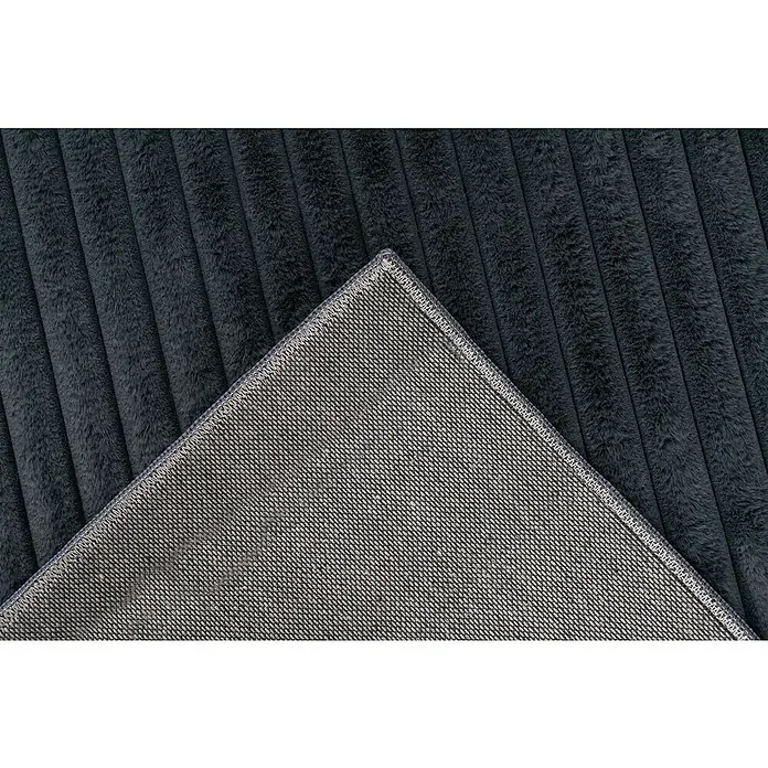 Hochflorteppich Plush - Graphite, 230 x 160 cm, 100 % Polyester - Nahaufnahme eines dunkelgrauen Cord-Teppichs, der seine weiche Textur und das einzigartige Design betont.