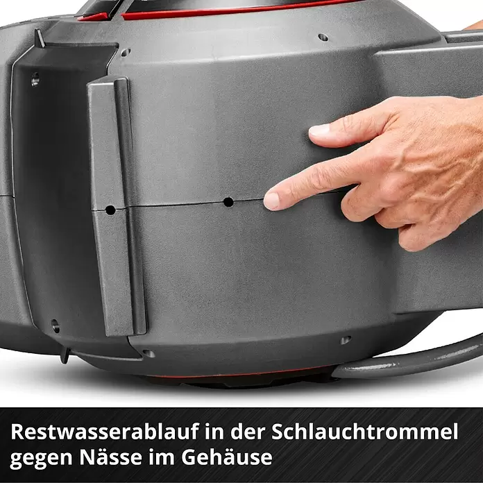 Einhell Power X-Change 18V Akku-Schlauchtrommel GE-HR 18/30-1 - 18 V, Ohne Akku - Graue Kunststoff-Schlauchtrommel mit Restwasserablauf. Eine Hand zeigt auf den Abfluss, der Feuchtigkeit im Gehäuse verhindert.