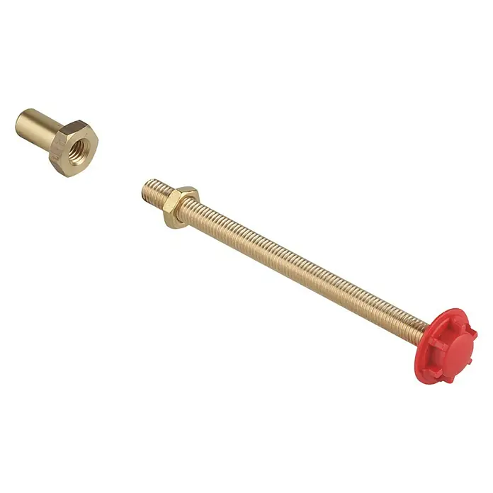 Grohe Umrüst-Set - Passend für: Grohe Urinal-Betätigungsplatte Surf - Eine goldfarbene Gewindestange mit roter Endkappe und goldenen Muttern.