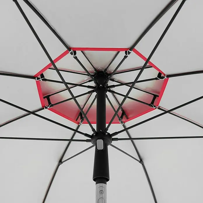 Doppler Strandschirm Windprofi Neo - Rot, Durchmesser Bespannung: 200 cm - Innenansicht eines geöffneten weißen Sonnenschirms mit rotem Rand, der die Konstruktion und das Design hervorhebt.