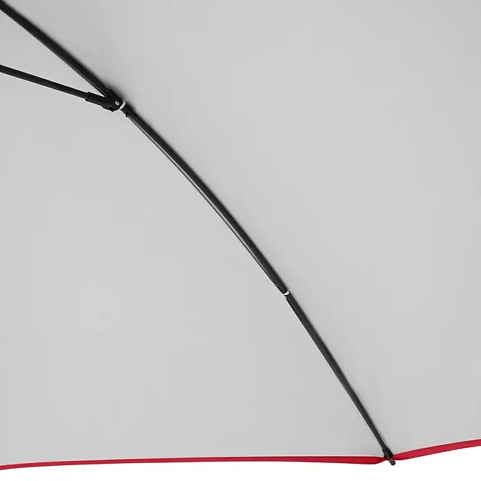 Doppler Strandschirm Windprofi Neo - Rot, Durchmesser Bespannung: 200 cm - Detailaufnahme eines Regenschirms mit rotem Rand und schwarzen Streben, der Schutz und Stil vereint.
