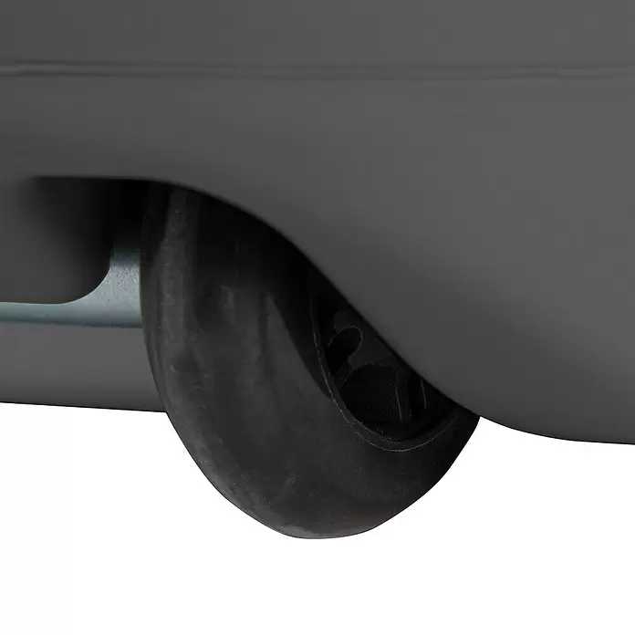 Doppler Active Schirmständer Fill-it - 60 x 60 cm, Passend für: Sonnenschirme bis zu 350 cm, Anthrazit - Ein schwarzes Kunststoffrad an einer grauen Basis, von unten gesehen.