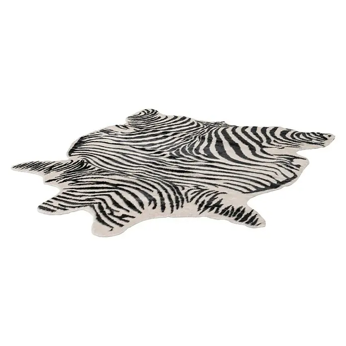 Kunstfell Rodeo - Schwarz/Weiß, 200 x 150 cm, 100 % Polyester, Zebra - Ein auffälliger Zebra-Teppich in ungewöhnlicher Form, der jedem Raum einen exotischen Touch verleiht und sofort ins Auge fällt.