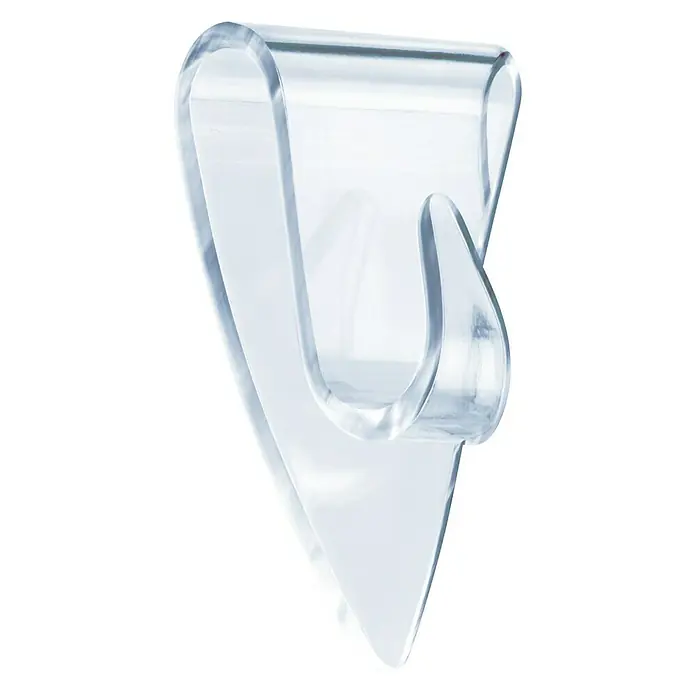 Tesa Klebehaken - Geeignet für: Glas, Belastbarkeit: 0,2 kg, 5 Stk., Transparent - Nahaufnahme eines transparenten Tischdeckenclips, der zur Befestigung einer Tischdecke dient und ein Verrutschen verhindert.