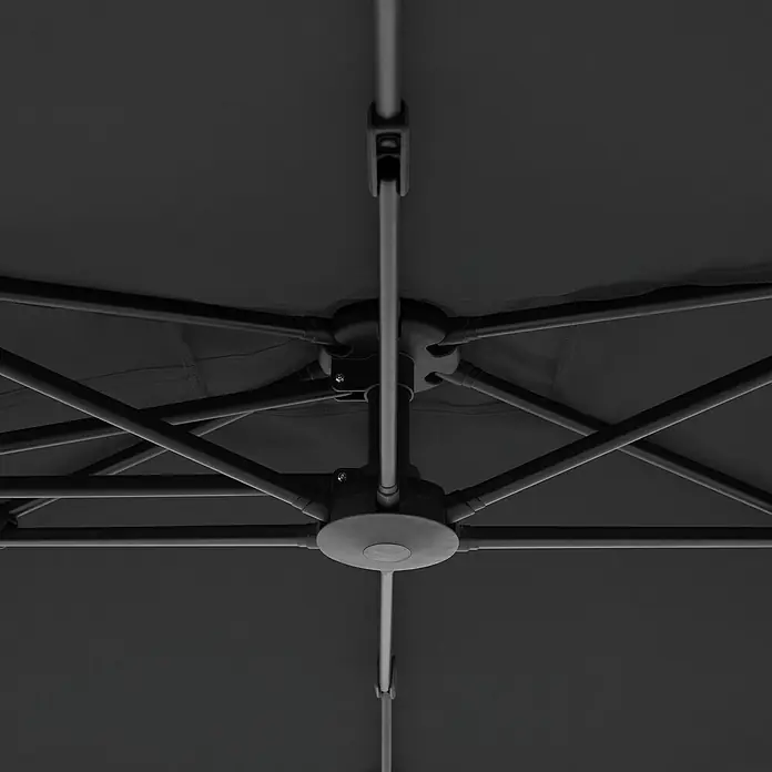 Doppler Active Ampelschirm Side City - Anthrazit, Bespannungsmaß (L x B): 240 x 135 cm - Detailaufnahme der Konstruktion eines Pavillons, die ein komplexes Netzwerk aus Streben und Verbindungsstücken zeigt.
