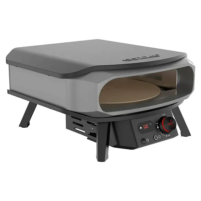 Cozze Pizzaofen Premium 17" - Grillfläche (B x T): 42,5 x 42,5 cm, 8 kW - Das Bild zeigt einen Cozze Pizzaofen. Der Ofen ist grau und hat einen schwarzen Sockel mit einem Drehknopf zur Temperaturregelung.