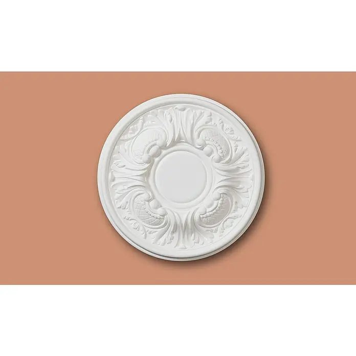 Nmc Decoflair Rosette M72Durchmesser: 30 cm, Hochverdichteter Polyurethanschaum (PU), Weiß - Detailaufnahme einer runden, weißen Deckenrosette mit floralen Ornamenten und zentralem Kreis auf einem rosafarbenen Hintergrund.