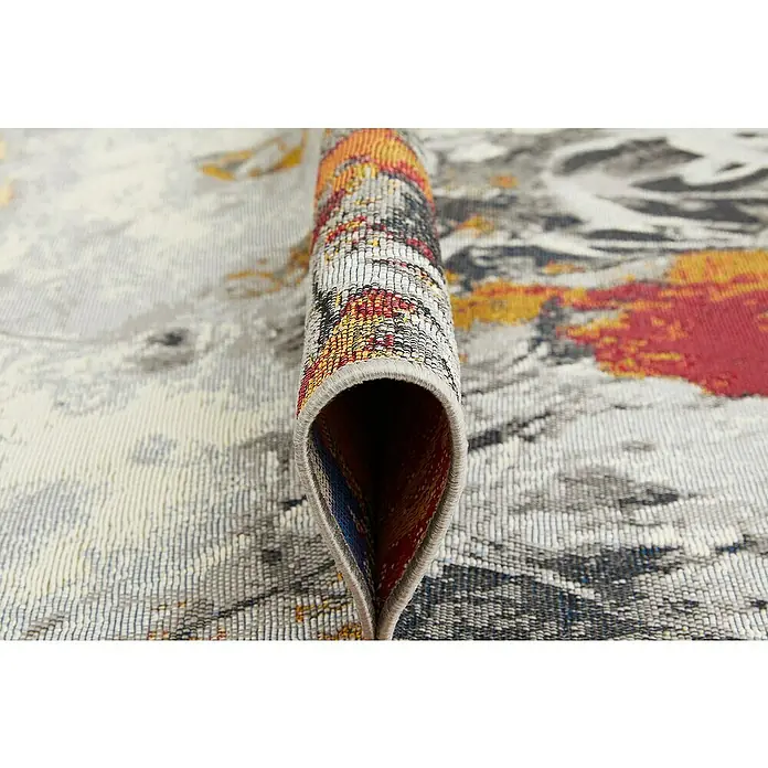 Outdoor-Teppich Portland - Grau/Bunt, 235 x 160 cm, 75 % Polypropylen, 25 % Polyester - Nahaufnahme eines detailreichen Teppichs mit abstraktem Muster und aufgerollter Kante, die die Textur und Farbpalette hervorhebt.