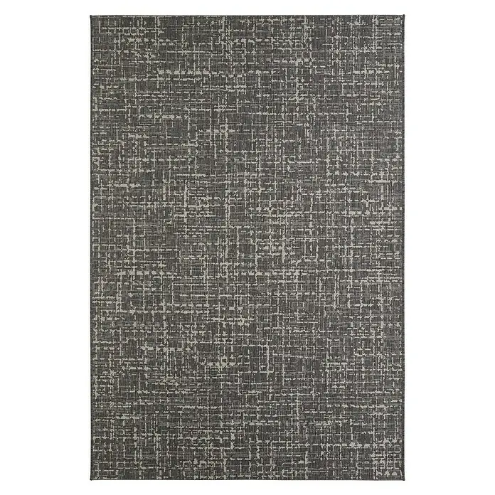 Outdoor-Teppich Newberry - Anthrazit/Creme, 170 x 120 cm, 100 % Polypropylen - Ein grauer Teppich mit einem abstrakten, helleren Muster, das eine moderne und stilvolle Textur für jeden Raum bietet.