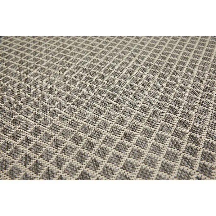 Outdoor-Teppich Newberry - Grau, 230 x 160 cm, 100 % Polypropylen - Nahaufnahme eines grauen und beigen Teppichs mit einem geometrischen Rautenmuster, das eine elegante Textur und ein ansprechendes Design zeigt.