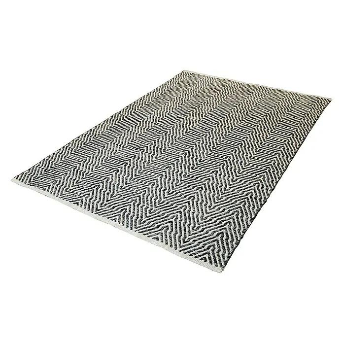 Kayoom Flachgewebeteppich Cocktail 400Grau, 230 x 160 cm, 100% Baumwolle - Ein rechteckiger Teppich mit einem abstrakten Zickzackmuster in Schwarz und Weiß. Ideal für Wohnzimmer oder Schlafzimmer zur Dekoration.