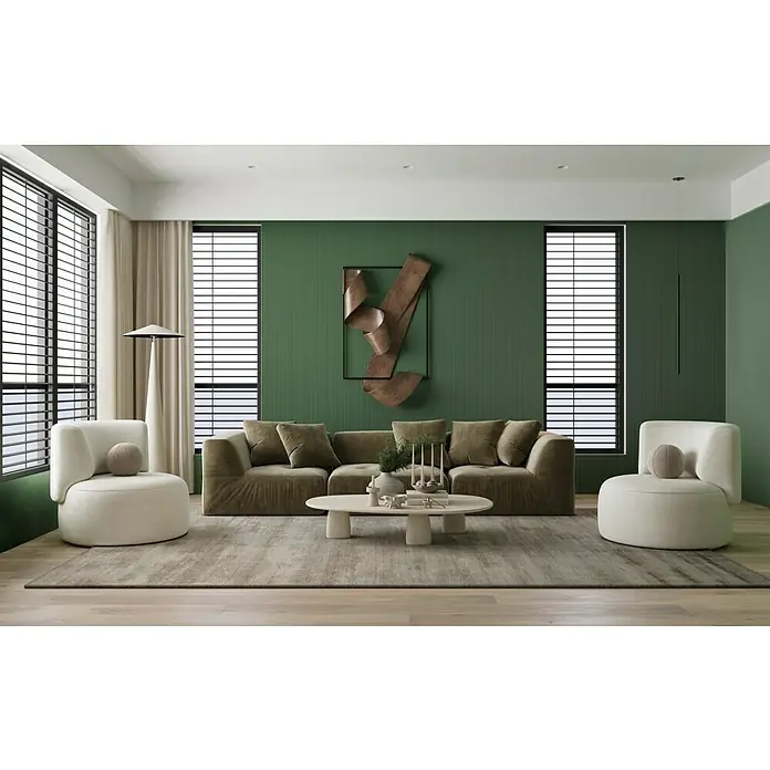 SCHÖNER WOHNEN-Kollektion Wandpaneel Stick - 1 Stk., Weiß, 1 m x 204 mm, Hochverdichtetes extrudiertes Polymer (HDPS) - Elegantes Wohnzimmer mit grünem Wandpaneel, bequemer Couch, Sesseln und modernem Couchtisch auf einem stilvollen Teppich.