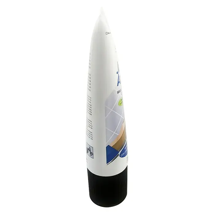 Masilla Juntas de Azulejos - Negro, 200 ml - Foto de un tubo blanco con tapón negro, probablemente para el cuidado de la piel, con información del producto y gráficos en la parte frontal.