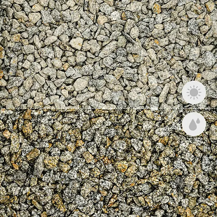 Min2C Granitsplitt - Anthrazit/Weiß, Körnung: 8 mm - 12 mm, 25 kg - Die Abbildung zeigt Splitt unter trockenen (oben) und nassen (unten) Bedingungen, wobei der Farbunterschied deutlich wird.