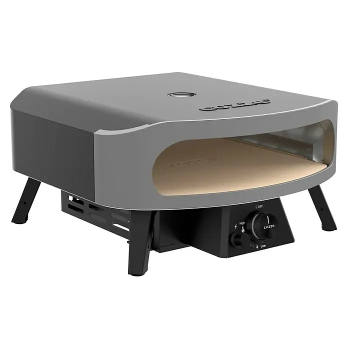 Cozze Pizzaofen Classic 17" - Grillfläche (B x T): 42,5 x 42,5 cm, 8 kW - Das Bild zeigt einen Cozze Pizzaofen in Grau- und Schwarztönen, der für den Außenbereich geeignet ist. Er hat einen Drehknopf zur Steuerung.