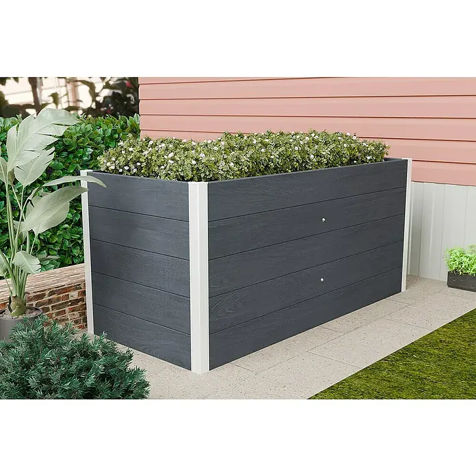 Hochbeet WPC - 160 x 75 x 70 cm, Verbundwerkstoff, Anthrazit - Großer, grauer Pflanzkasten mit weißer Umrandung, bepflanzt mit üppigen grünen Pflanzen, ideal für Garten oder Terrasse.