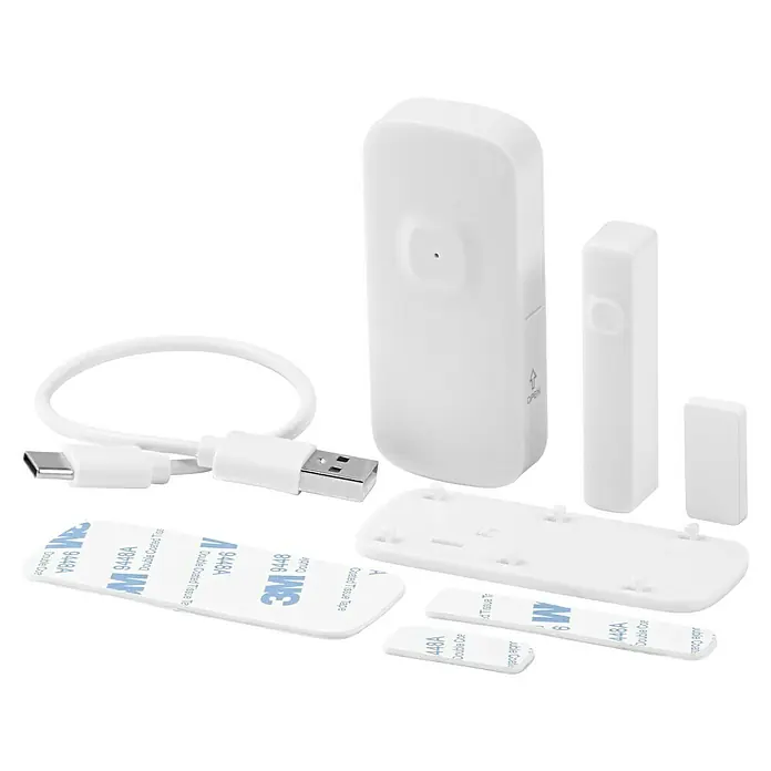 Osram Fenster- & Türsensor-Set Kontaktsensor - Weiß - Nahaufnahme eines weißen Tür- und Fenstersensors mit Montagezubehör und USB-Kabel auf schwarzem Hintergrund.