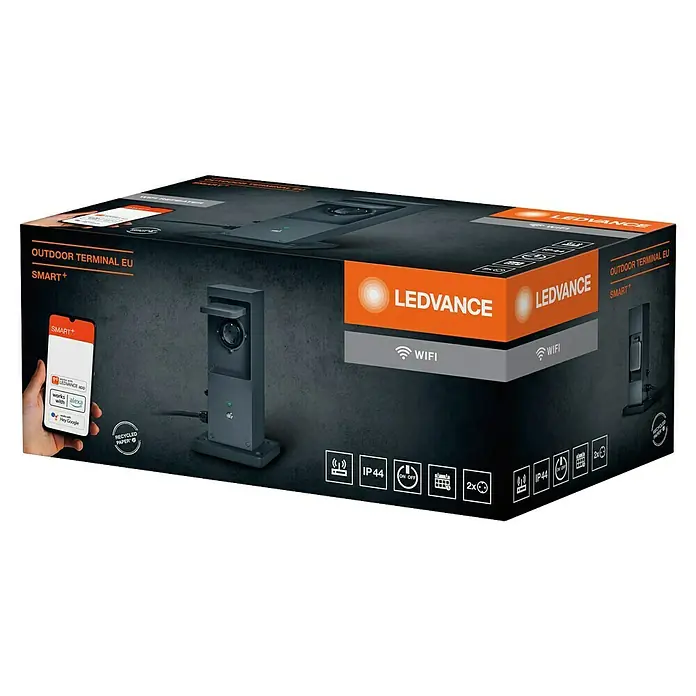 Ledvance Smart+ WiFi Energiesäule mit integriertem WLAN-Repeater und zwei smarten Steckdosen - Anthrazit - Die Verpackung des LEDVANCE Outdoor Terminal EU Smart+ Geräts mit Produktbildern und relevanten Logos.
