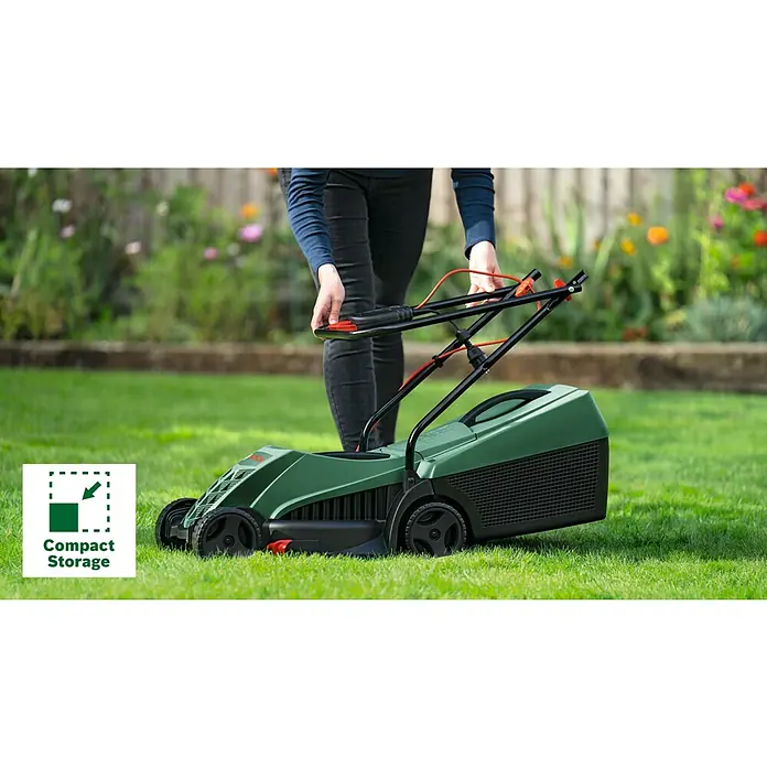 Bosch Cortacésped eléctrico Easy Rotak 32 - 1.200 W, Ancho de corte: 32 cm - Una persona montando una cortadora de césped Bosch verde, destacando el almacenamiento compacto de la cortadora.