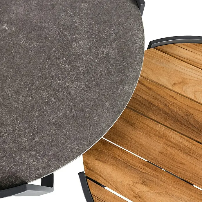 Kactus republic Conjunto de muebles Mónaco - 5 pzs., Aluminio/Teca, Antracita - Primer plano de una mesa redonda con tablero gris y un segundo tablero hecho con listones de madera.