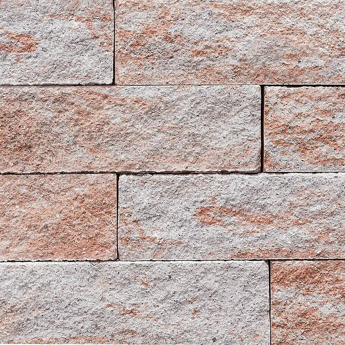 EHL Mauerstein Anzio Light - 50 x 18 x 15 cm, Sandstein, Beton - Detailaufnahme einer Wand aus rötlich-grauen Verblendsteinen, die eine robuste und natürliche Optik vermitteln.