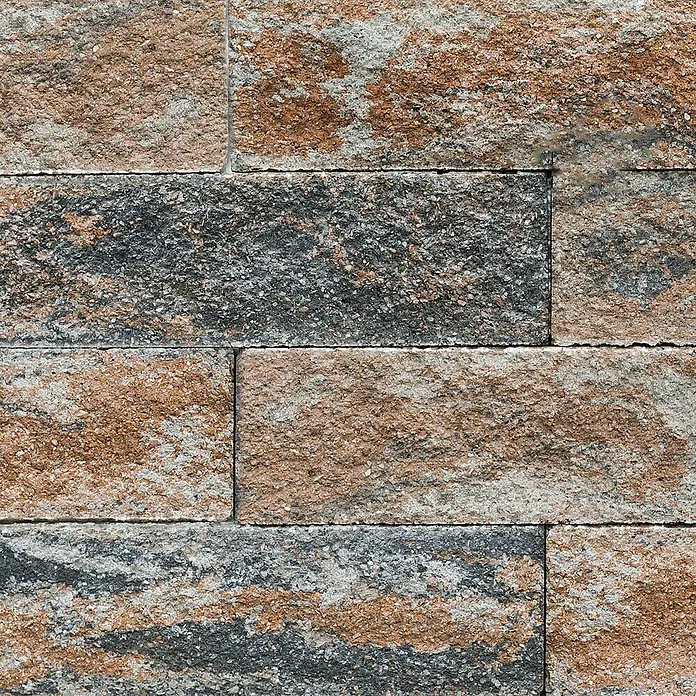 EHL Mauerstein Anzio Light - 25 x 18 x 15 cm, Muschelkalk, Beton - Nahaufnahme von mehrfarbigen Pflastersteinen mit rauer Textur, ideal für Gartenwege und Terrassen.