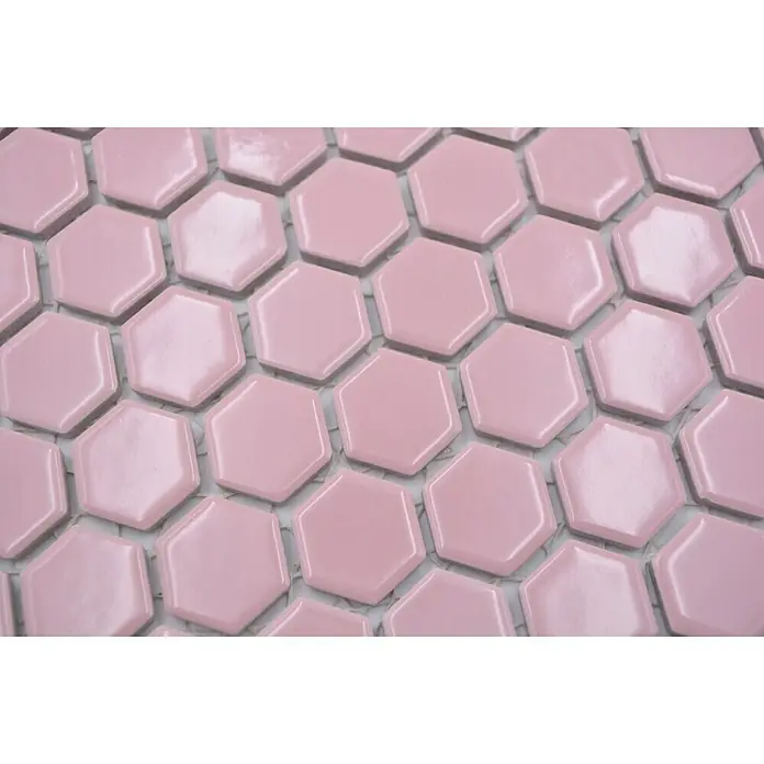 Mosaikfliese Hexagon Uni HX 220 - 26 x 30 cm, Rosa, Glänzend - Nahaufnahme von rosa sechseckigen Keramikfliesen, die ein modernes, stilvolles Muster für Innenräume bilden.