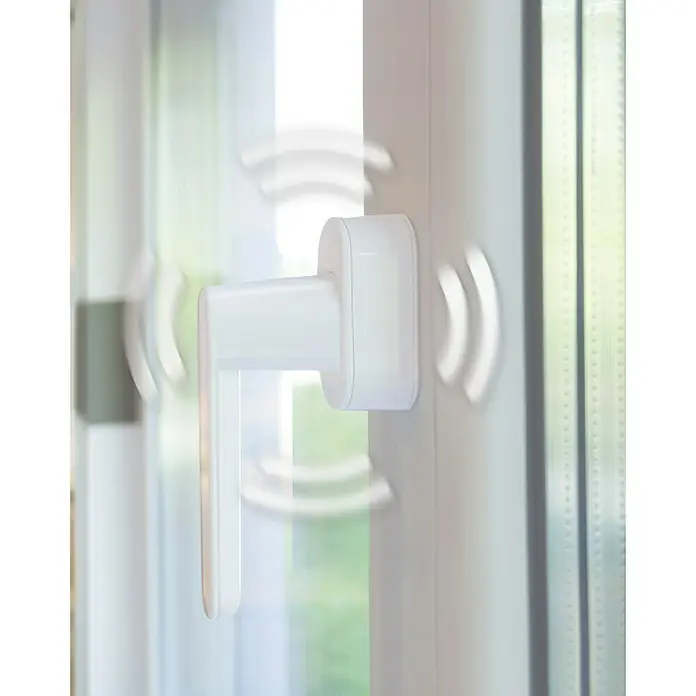 Schellenberg Manilla de ventana con alarma - Blanco, 115 dB - Primer plano de una manija de ventana con un mecanismo de bloqueo inteligente, que combina seguridad y comodidad.\n