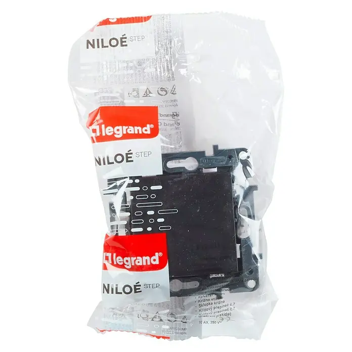 Legrand Niloé Step Cruzamiento - Antracita, Instalar, IP44 - Primer plano de una unidad de interruptor Legrand Niloe Step empaquetada, ideal para instalaciones eléctricas con fácil configuración.