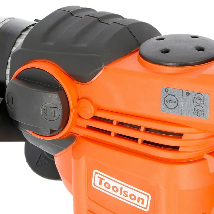 Toolson Kombihammer Pro-BH 900 - 900 W, 3 J, SDS-Plus-Aufnahme - Nahaufnahme einer orangefarbenen Toolson-Bohrmaschine, die die Details der Konstruktion und das Markenlogo zeigt.