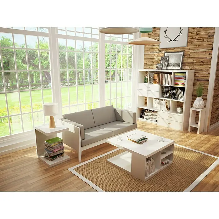Phönix Solina Beistelltisch - L x B x H: 40 x 50 x 58,4 cm, Weiß - Ein helles Wohnzimmer mit einem grauen Sofa, einem Couchtisch und einem Bücherregal. Die Einrichtung strahlt moderne Eleganz aus.