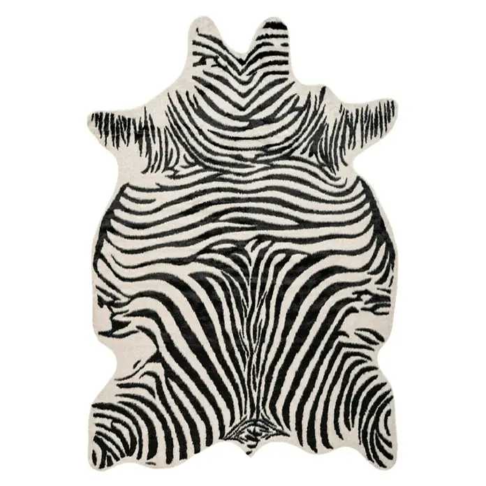 Kunstfell Rodeo - Schwarz/Weiß, 200 x 150 cm, 100 % Polyester, Zebra - Zebra-Fellteppich: Einzigartiger Teppich in Form eines Zebrafells mit markantem Schwarz-Weiß-Streifenmuster für einen auffälligen Akzent in jedem Raum.